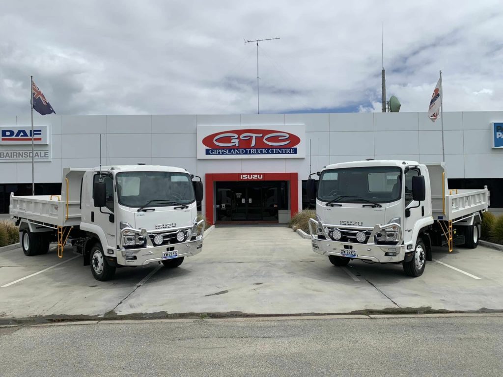 Image of Gippsland Truck Centre building with two trucks at the front